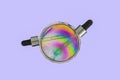 Serum dropper in a petri dish on a plastic film rainbow colored by photoelasticity isolated on light purple background