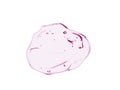 Serum texture. Clear cosmetic liquid gel with bubbles swatch isolated on white background. Pink transparent skincare product