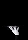 Servant white glove holds stainless steel tray Royalty Free Stock Photo