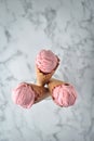 Serve up delicious strawberry ice cream and crunchy waffle cones. Uncommonly Made. top view Royalty Free Stock Photo