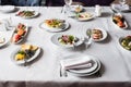 Served for banquet restaurant table with dishes, snack, cutlery, glasses Royalty Free Stock Photo