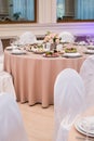 Served for banquet restaurant table with dishes, snack, cutlery, wine and water glasses, european food, selective focus Royalty Free Stock Photo