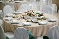 Served for banquet restaurant table with dishes, snack, cutlery, wine and water glasses, european food, selective focus Royalty Free Stock Photo