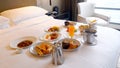 Served breakfast in bed in luxury modern hotel Royalty Free Stock Photo