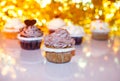 Served cupcake selection with warm orange yellow backdrop