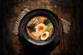 served dinner table with japanese tonkotsu ramen bowl