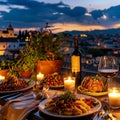 Served Dinner Table on Roof Terrace, Evening Food with Wine, Romantic Candles, Old Town View Royalty Free Stock Photo