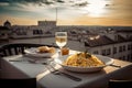 Served Dinner Table on Roof Terrace, Evening Food with Wine, Romantic Candles, Old Town View