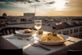 Served Dinner Table on Roof Terrace, Evening Food with Wine, Romantic Candles, Old Town View Royalty Free Stock Photo