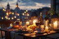 Served Dinner Table on Roof Terrace, Evening Food with Wine, Romantic Candles, Old Town View Royalty Free Stock Photo