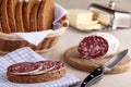 Served kitchen table, sandwich, salami, bread Royalty Free Stock Photo