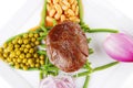 Served meat medalion on beans Royalty Free Stock Photo