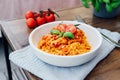 Served plate of just cooked homemade fettuccine pasta with creamy tomato sauce, seafood and parmesan cheese, decorated Royalty Free Stock Photo