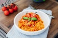 Served plate of just cooked homemade fettuccine pasta with creamy tomato sauce, seafood and parmesan cheese, decorated Royalty Free Stock Photo