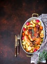 Served roasted Thanksgiving Turkey with vegetables on brown rustic background. Royalty Free Stock Photo