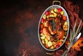 Served roasted Thanksgiving Turkey with vegetables on brown rustic background. Royalty Free Stock Photo