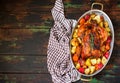 Served roasted Thanksgiving Turkey with vegetables on rustic background. Royalty Free Stock Photo