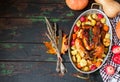 Served roasted Thanksgiving Turkey with vegetables on wooden background Royalty Free Stock Photo