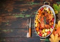 Served roasted Thanksgiving Turkey with vegetables on wooden background Royalty Free Stock Photo