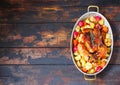 Served roasted Thanksgiving Turkey with vegetables on wooden background. Royalty Free Stock Photo