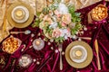 Served table with bouquet and candles