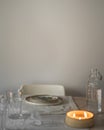 served table before dinner with a large burning candle Royalty Free Stock Photo