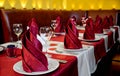 Served table for a lot of people for a banquet dinner for .There Royalty Free Stock Photo