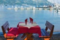 Served table on sea beach restaurant of Budva, Montenegro Royalty Free Stock Photo