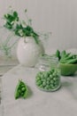 Served table with vases with flowers