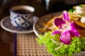 Served thai noodles and a cup of tea Royalty Free Stock Photo