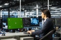 Server farm IT professional using green screen PC, deploying deep learning tools Royalty Free Stock Photo