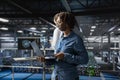 Server farm woman manager overseeing workers doing AI automatization Royalty Free Stock Photo
