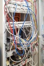 In A Server Rack Many Different Colored Network Cables Are Connected To The Network Switches