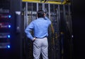 Server room, cables or confused man with hardware for cybersecurity glitch or software solution. Doubt, man or back of Royalty Free Stock Photo