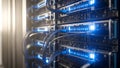 Server Room Rack with Blue Lights and Cables - Data Center Technology Royalty Free Stock Photo