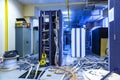 Server room with racks in datacenter and internet problem causing by disorder of wiring.