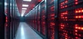 Server room with rows of cabinets glowing with red lights. Data center hallway with servers and network equipment. Computer Royalty Free Stock Photo