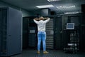 Server room, IT support or electrician with a hardware problem stressed with maintenance or glitch crisis. Confused or Royalty Free Stock Photo