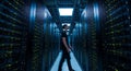 Server Room Technician Walking Through Data Center Royalty Free Stock Photo