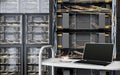 Servers and hardware room with notebook and coffee cup computer technology closeup photo Royalty Free Stock Photo