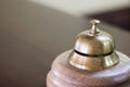 Service bell in a hotel reception for concierge alarm on desk. Royalty Free Stock Photo