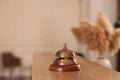 Service bell on wooden reception desk in hotel Royalty Free Stock Photo