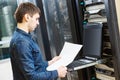 Service engineer in server room Royalty Free Stock Photo