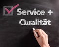 Service and Quality Texts on Board with Check Box Royalty Free Stock Photo