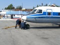 Service of the Russian Antonov an-38 at the airfield technician working people