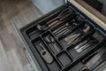 Service set of cutlery set: silver spoons, forks and knifes. Kitchen supplies close up view. Ready to eat concept Royalty Free Stock Photo