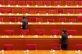 Service staff clearing tables after China's parliament session