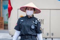 Service staff in the park of an extinct volcano Rock Hill Volcanoe Haikou. Chinese woman in uniform rangers