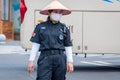 Service staff in the park of an extinct volcano Rock Hill Volcanoe Haikou. Chinese woman in uniform rangers