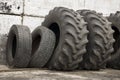 Service station for cars. Old tires on the yard